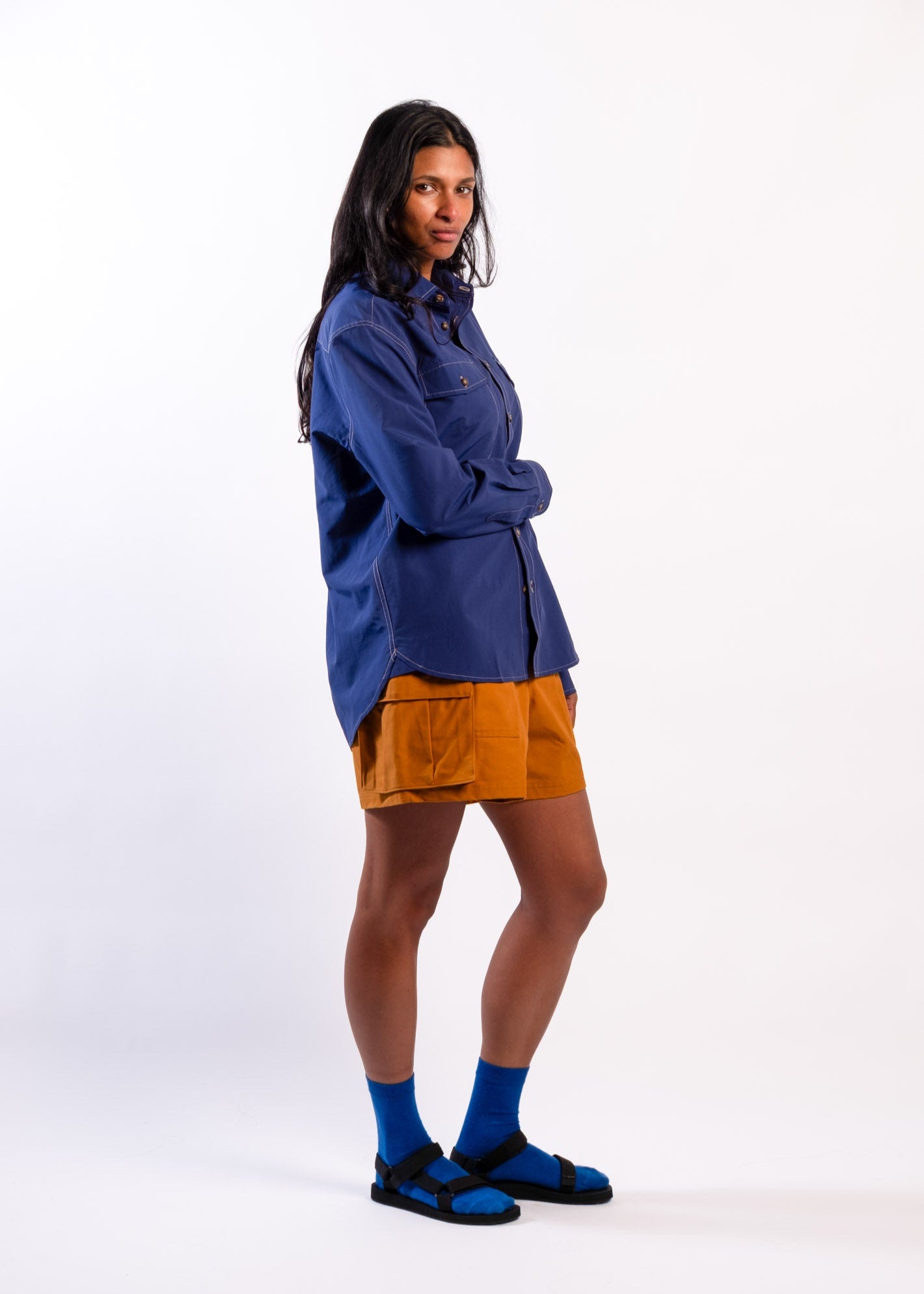 Person wearing a blue Sun Ray UPF50+ sun protection overshirt