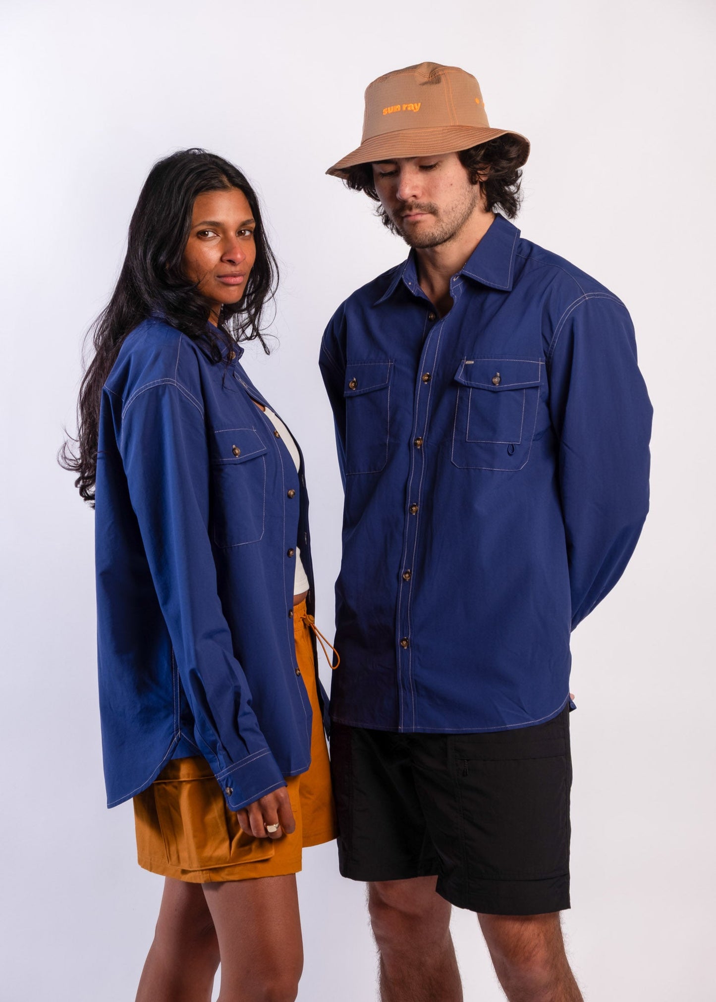 Coupl wearing a blue Sun Ray UPF50+ sun protection overshirt
