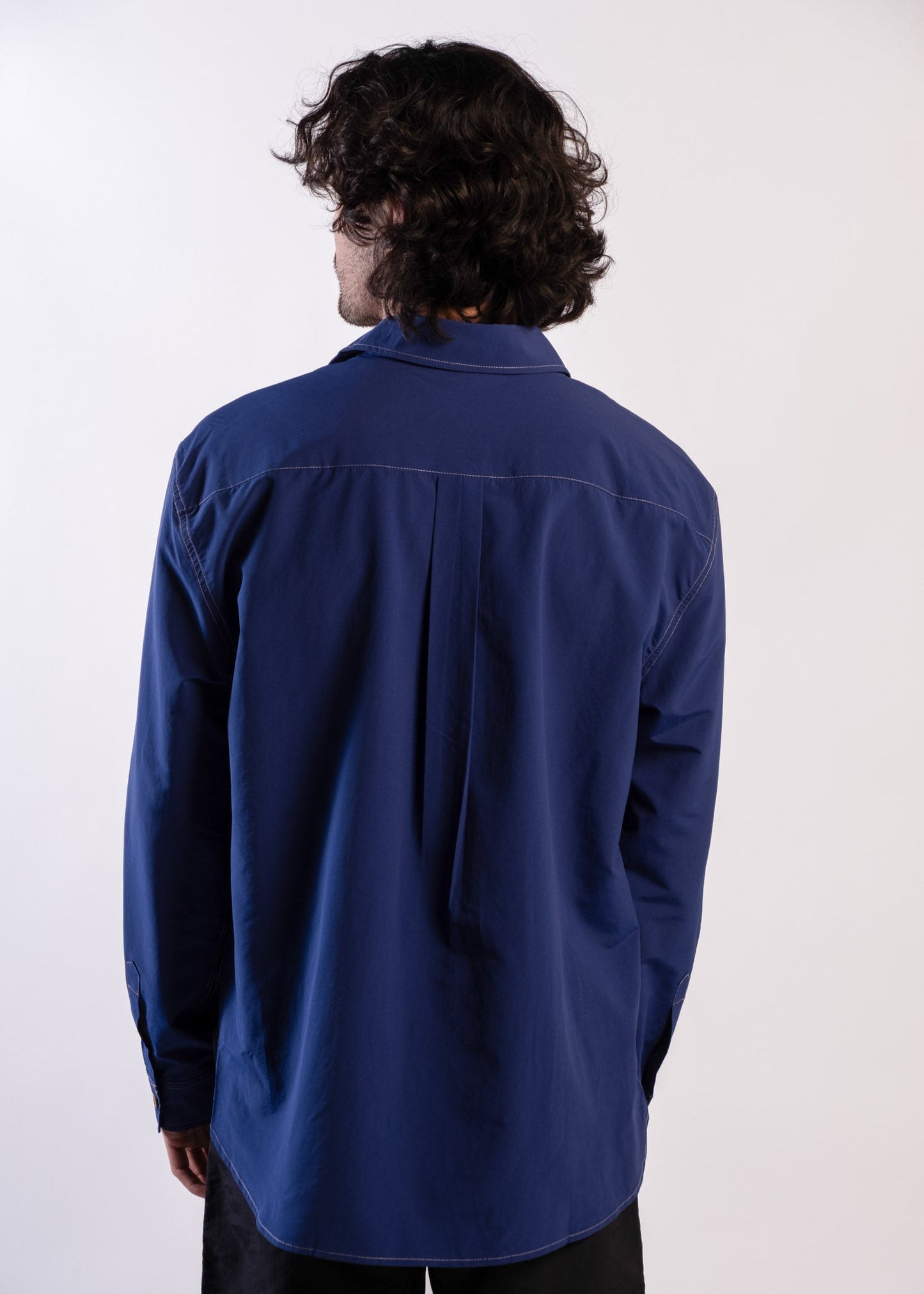 Person wearing a blue Sun Ray UPF50+ sun protection overshirt