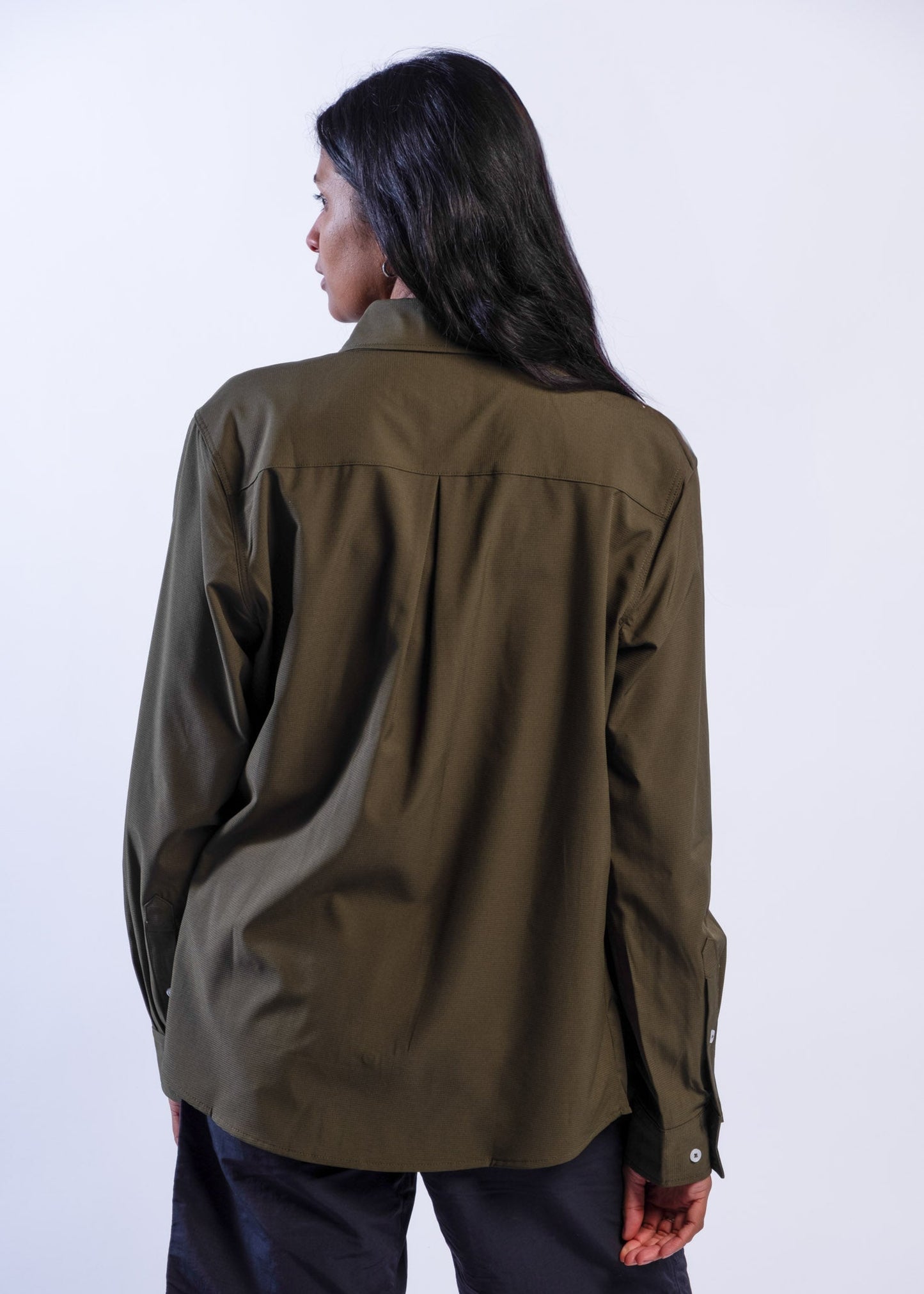 Person wearing olive green Sun Ray UPF50+ sun protection sun shirt