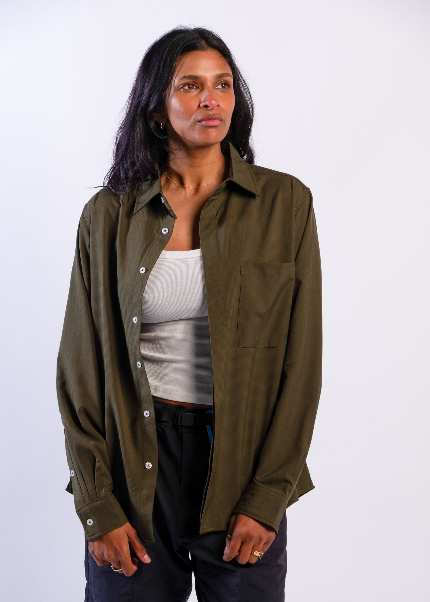Person wearing olive green Sun Ray UPF50+ sun protection sun shirt