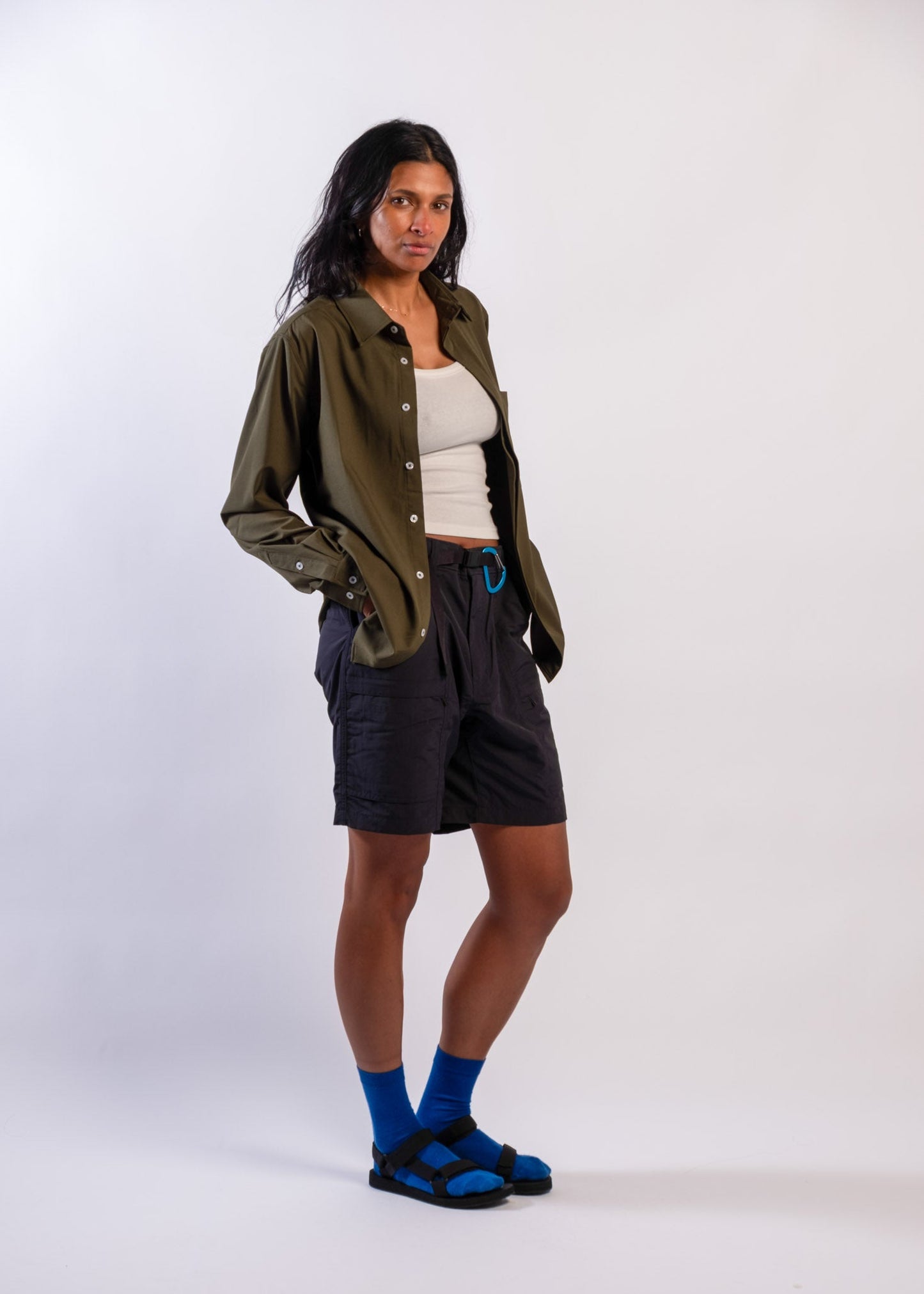 Person wearing olive green Sun Ray UPF50+ sun protection sun shirt