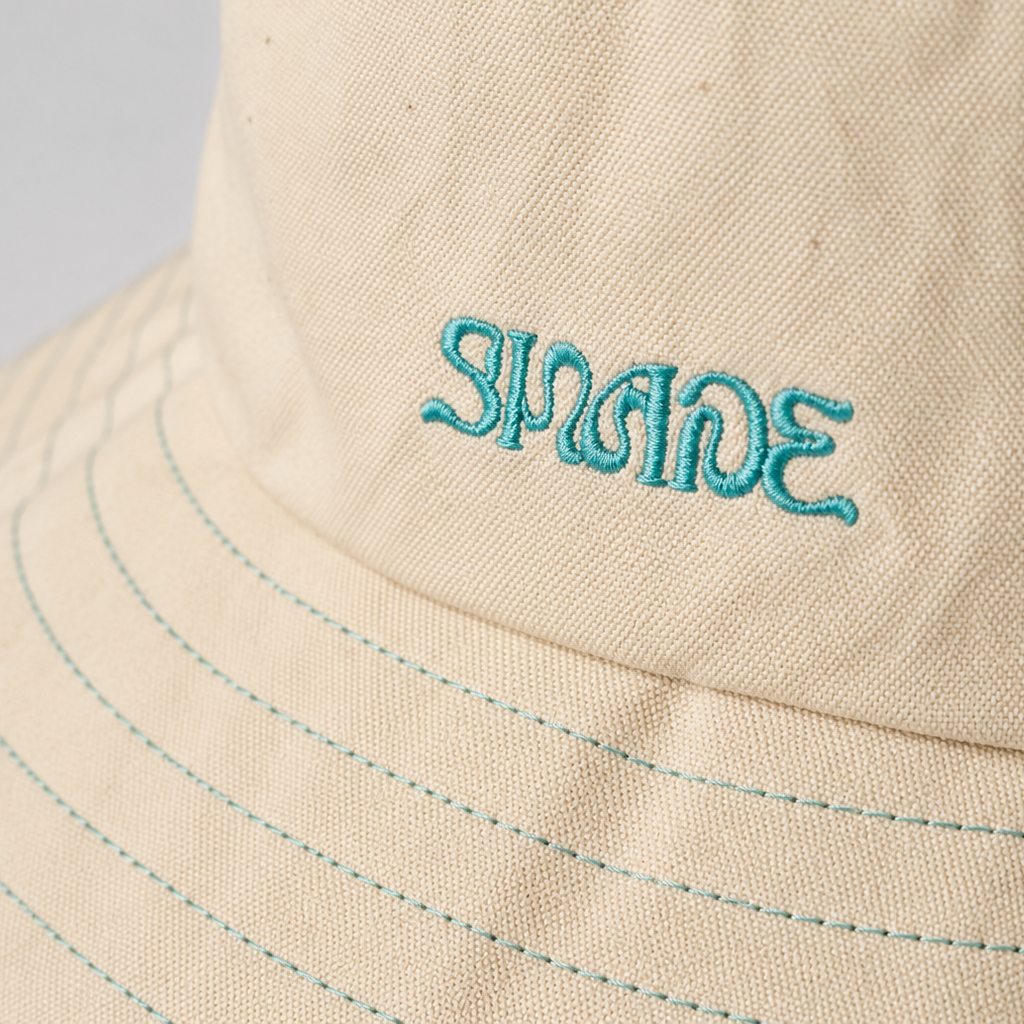 Frayed brim edge and aqua topstitching on Sun Ray UPF50+ cotton sun hat