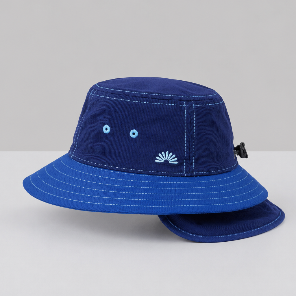 A navy blue kids bucket hat with detachable neck flap made from UPF50+ fabric.