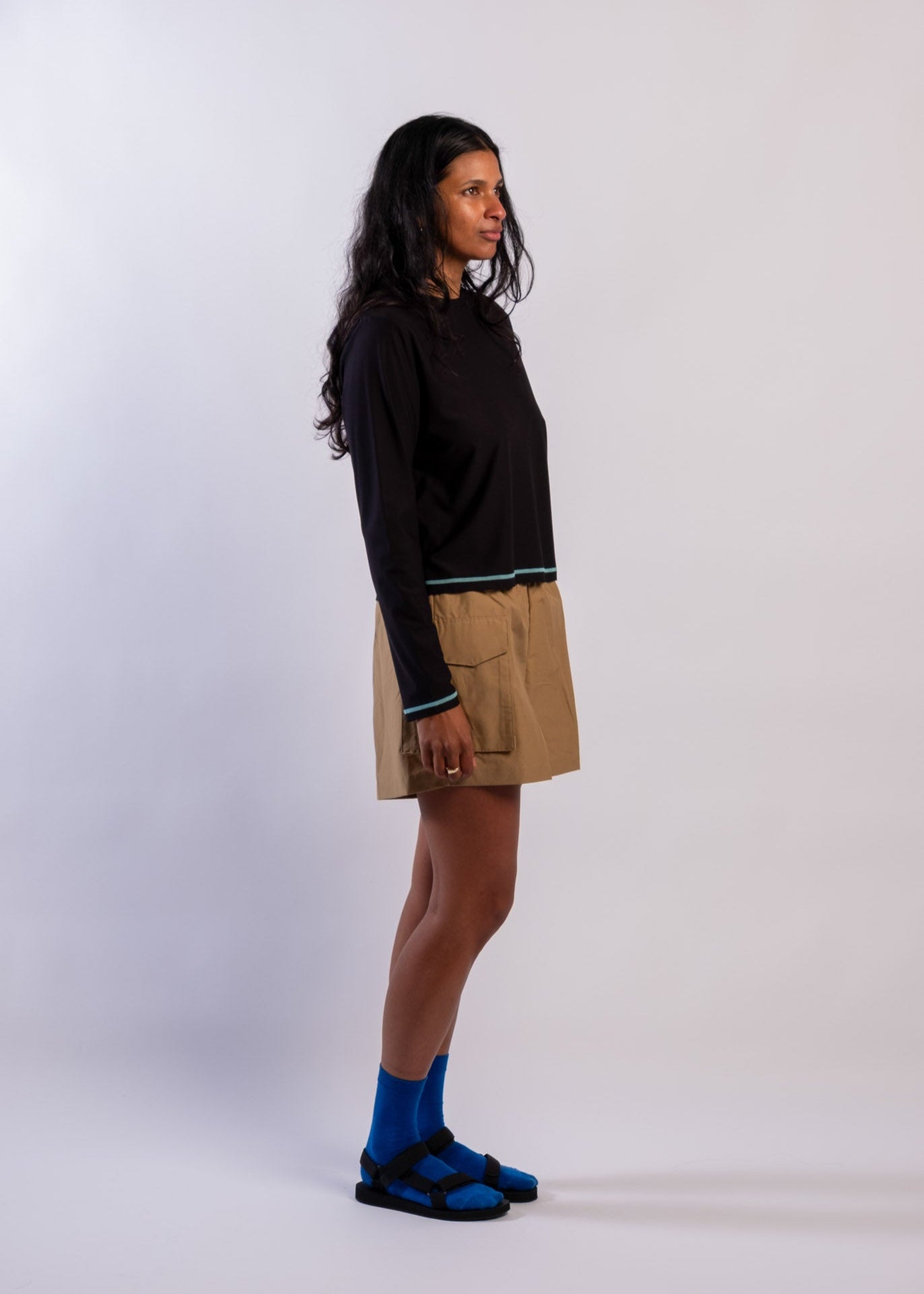 Woman wearing Sun Ray UPF50+ sun protection black long-sleeve top