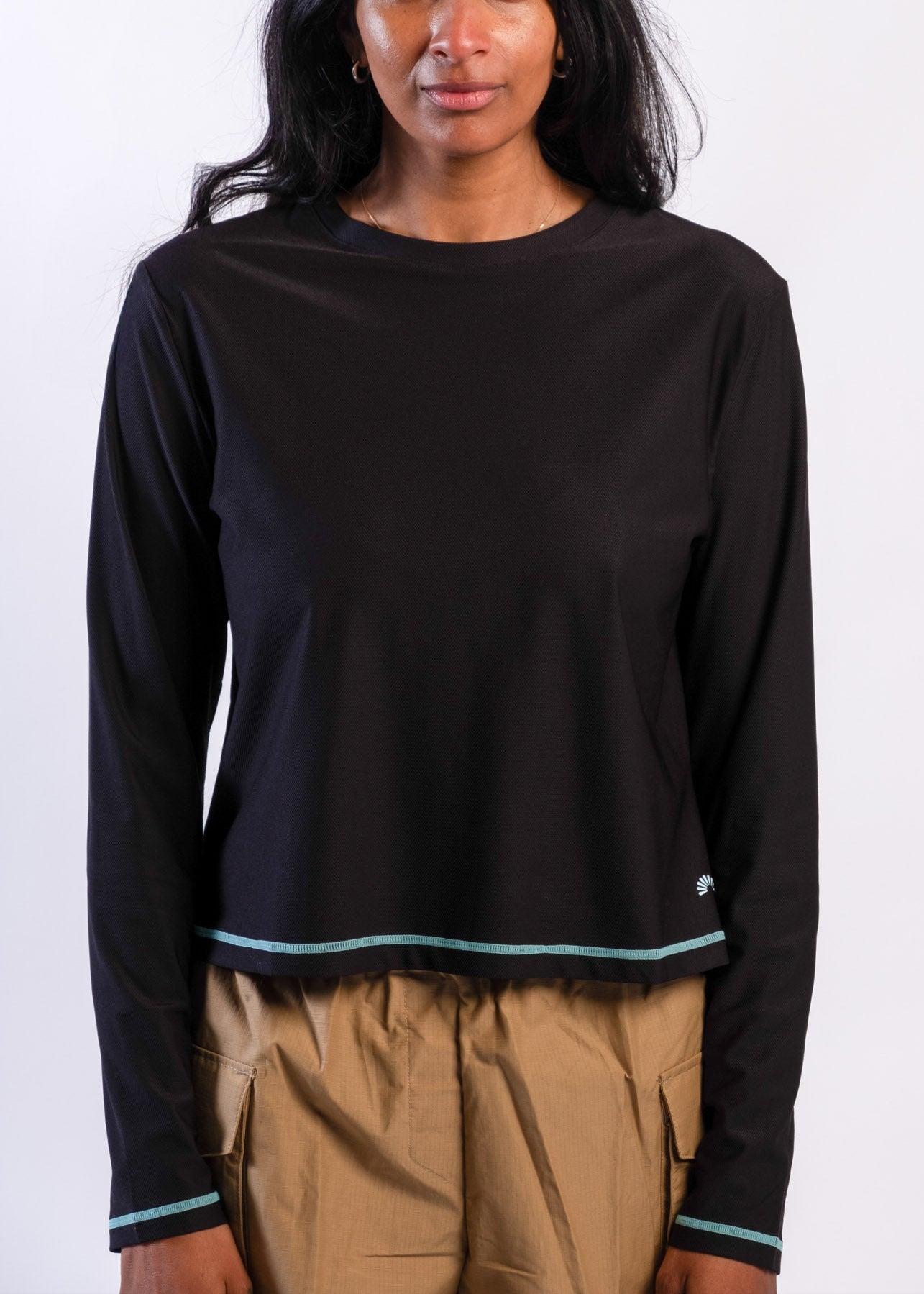 Woman wearing Sun Ray UPF50+ sun protection black long-sleeve top