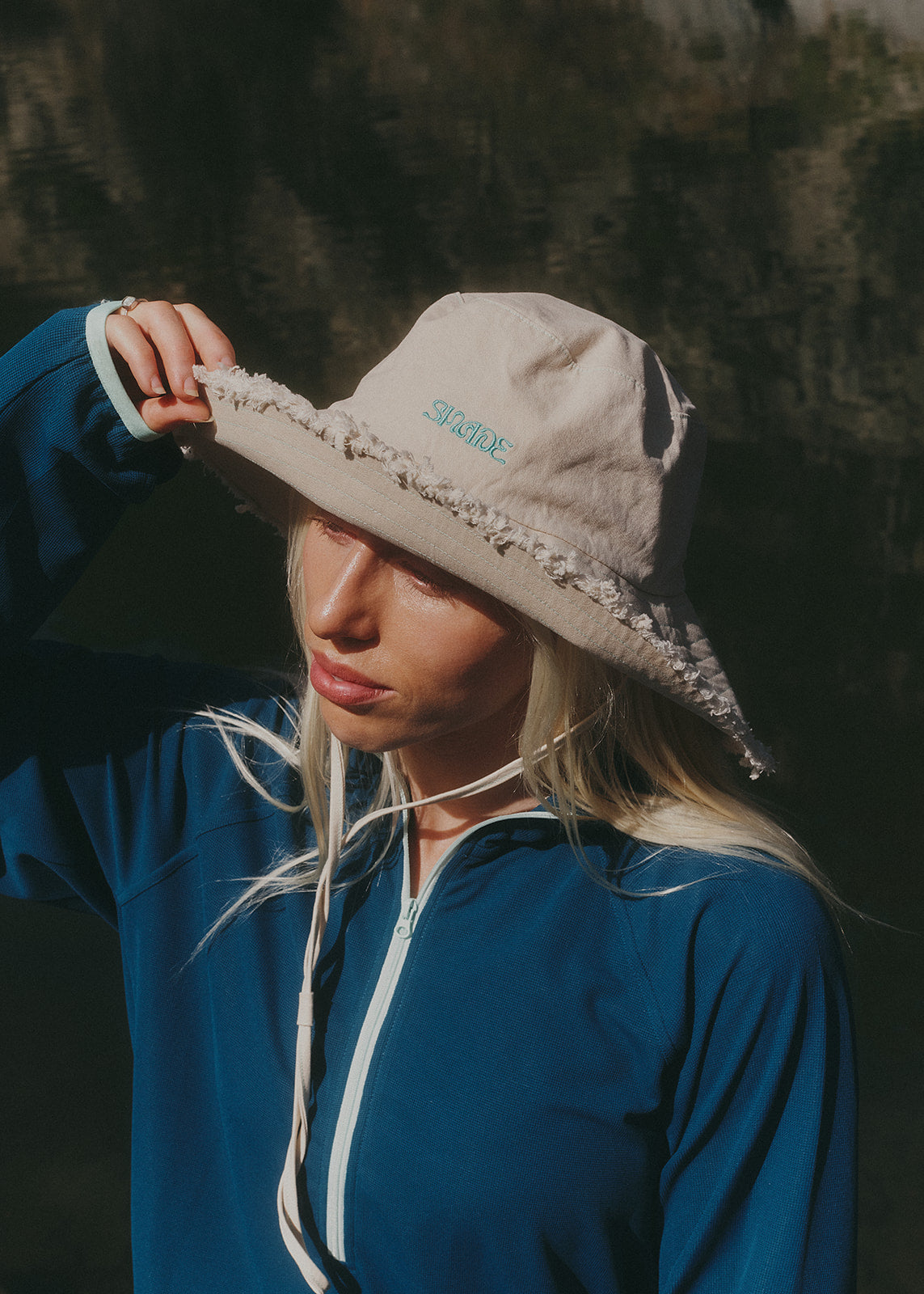 Frayed brim edge and aqua topstitching on Sun Ray UPF50+ cotton sun hat