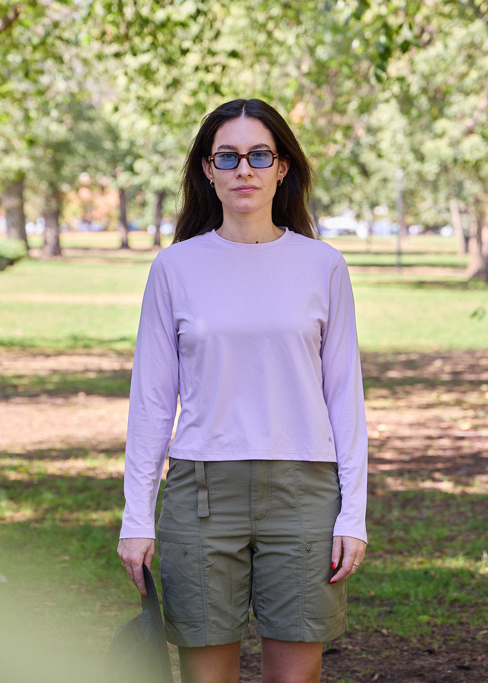 A sun smart woman wears the Sun Ray UPF50+ Sun Protection Clothing All G Long Sleeve Tee lilac boxy fit