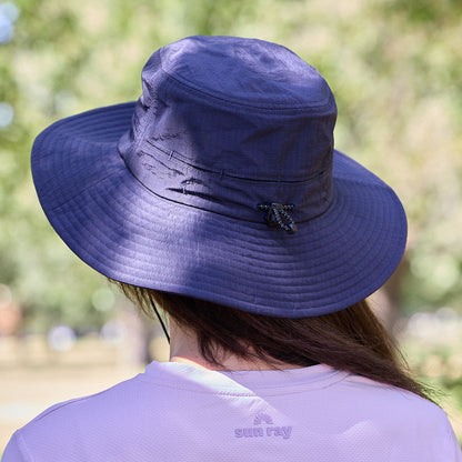 A sun smart woman wears the Sun Ray UPF50+ Sun Protection Breezy Brimmer Hat