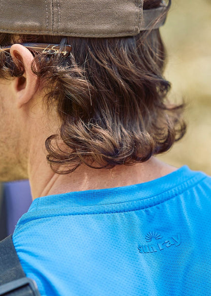 Sun smart man in Sun Ray UPF50+ Sun Protection Clothing All G Long Sleeve Tee True Blue and Shade Cap Australia