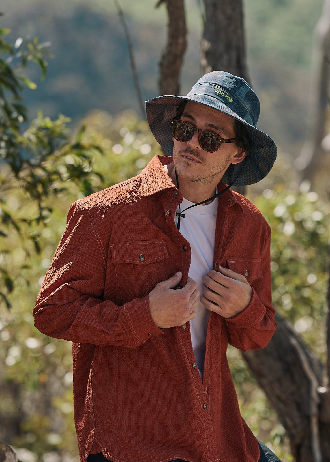 Person wearing Sun Ray UPF50+ sun protection seersucker overshirt sun shirt