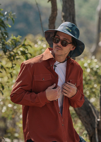 Person wearing Sun Ray UPF50+ sun protection seersucker overshirt sun shirt