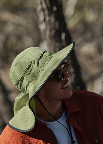 Person wearing a sun ray green sun protection UPF50+ seriously shady hat with neck cover