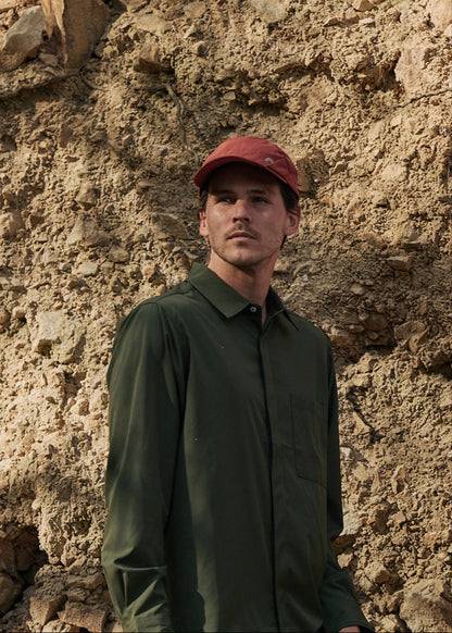 Person wearing olive green Sun Ray UPF50+ sun protection sun shirt