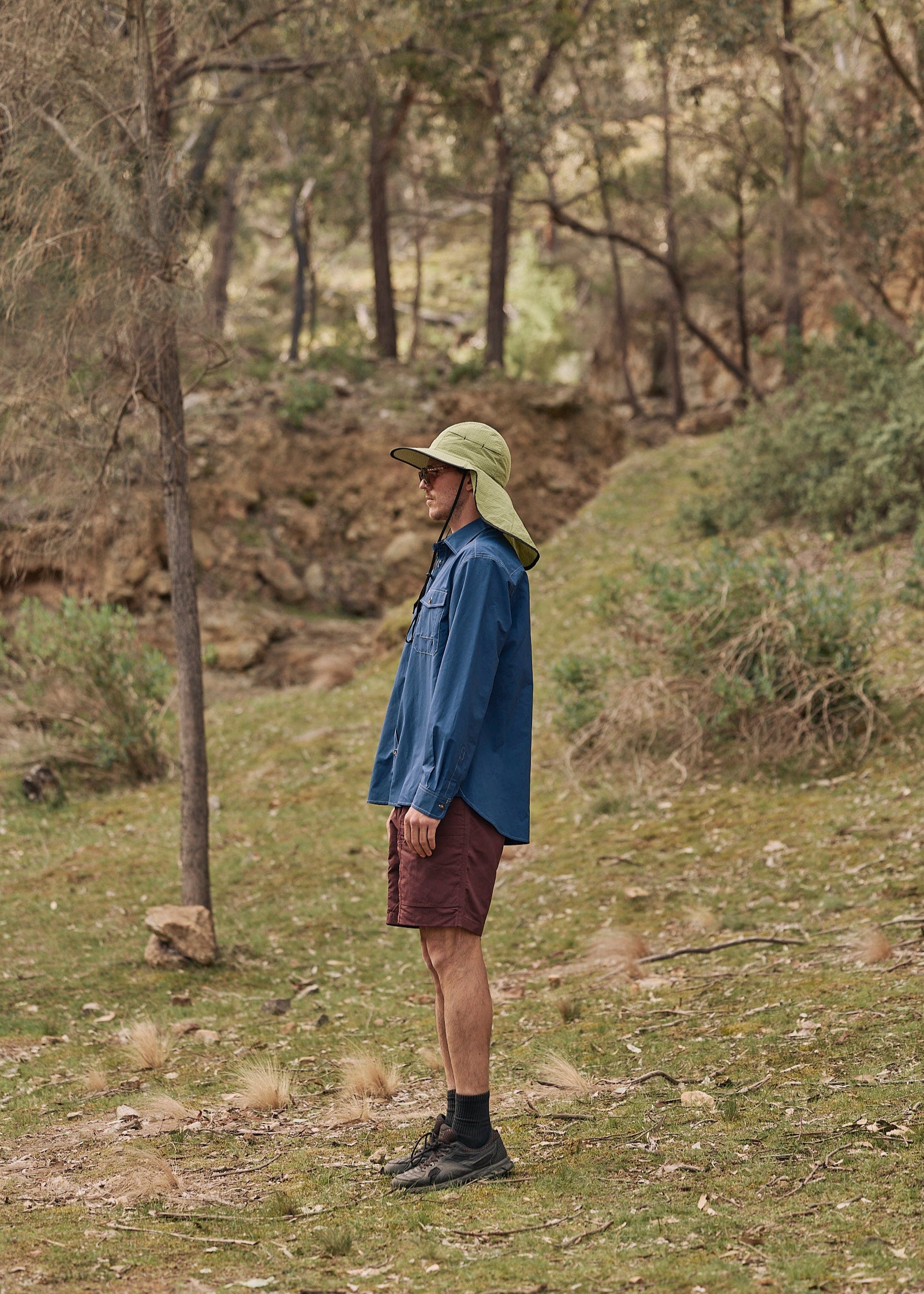 Person wearing a blue Sun Ray UPF50+ sun protection overshirt sun shirt