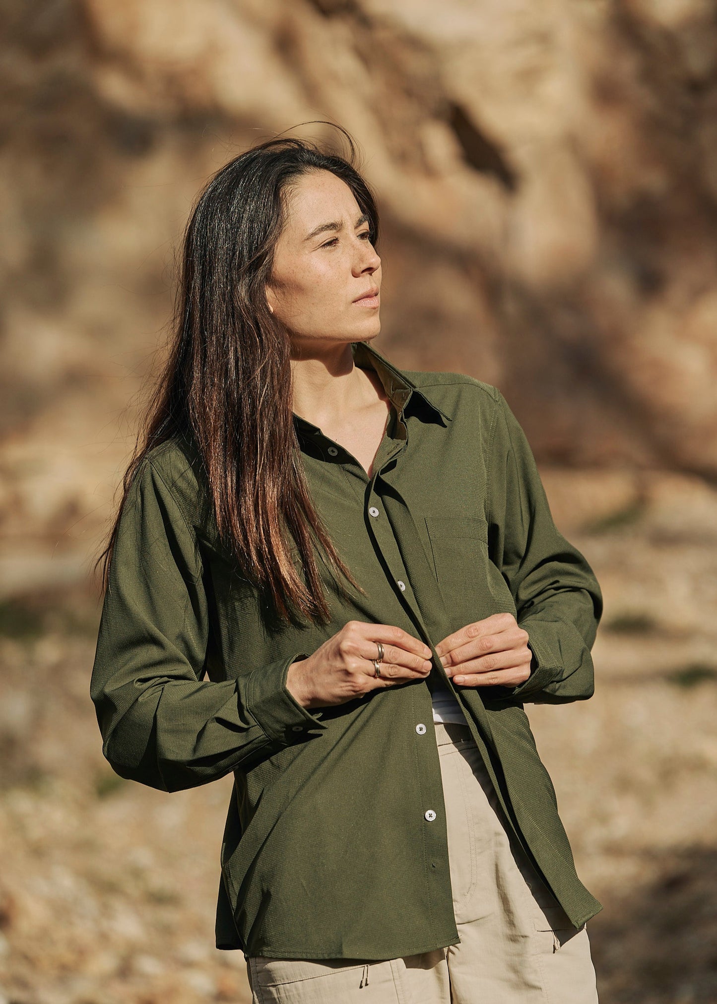 Person wearing olive green Sun Ray UPF50+ sun protection sun shirt