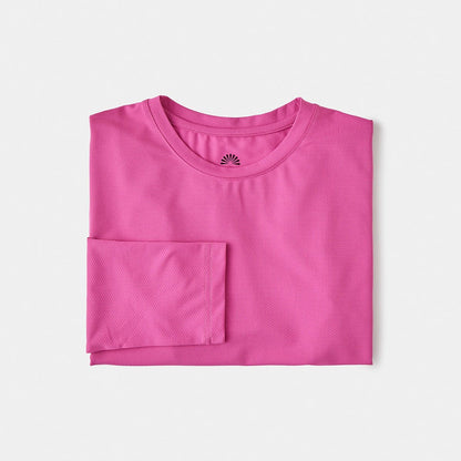 A sun smart woman wears the Sun Ray UPF50+ Sun Protection Clothing All G Long Sleeve Tee fuchsia boxy fit and Shade Cap in Australia