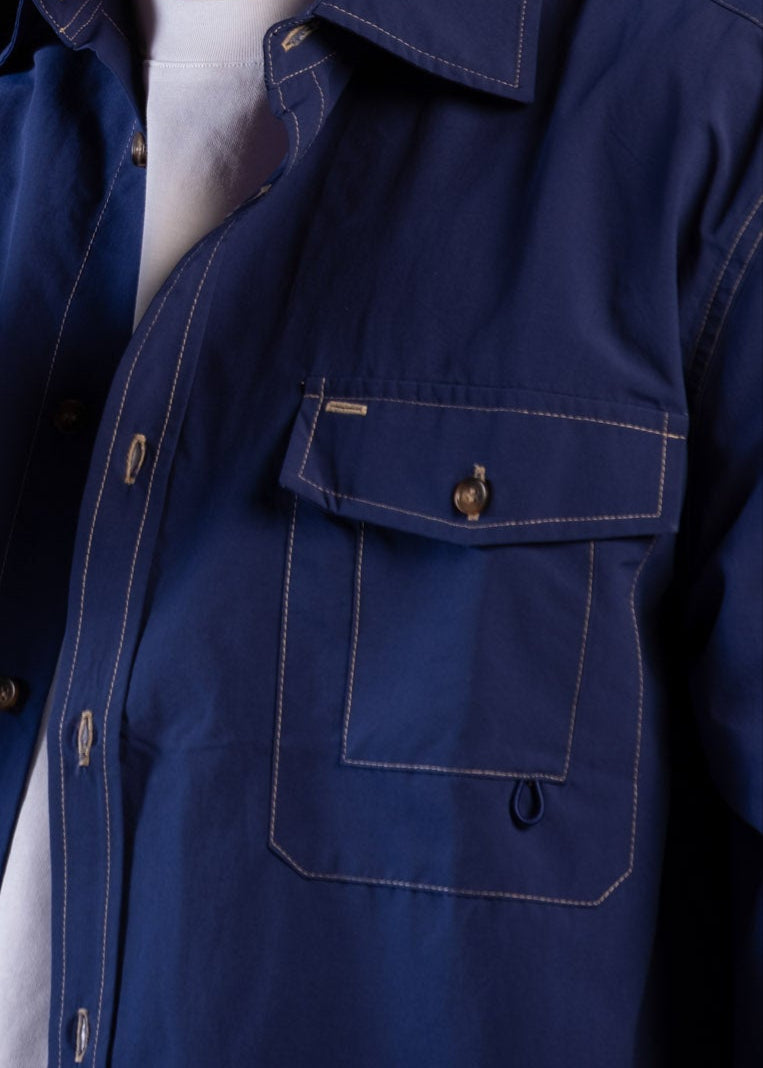 Person wearing a blue Sun Ray UPF50+ sun protection overshirt
