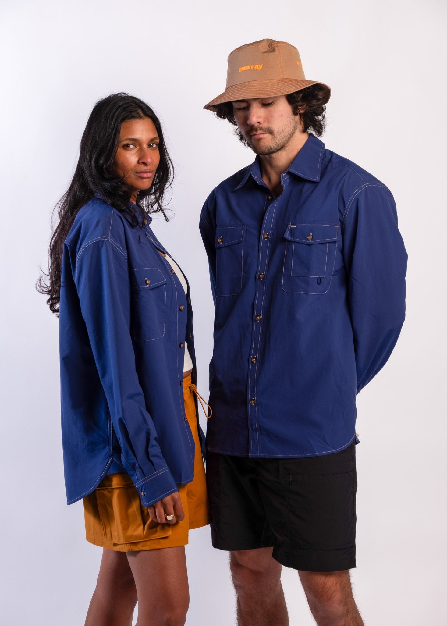 Coupl wearing a blue Sun Ray UPF50+ sun protection overshirt