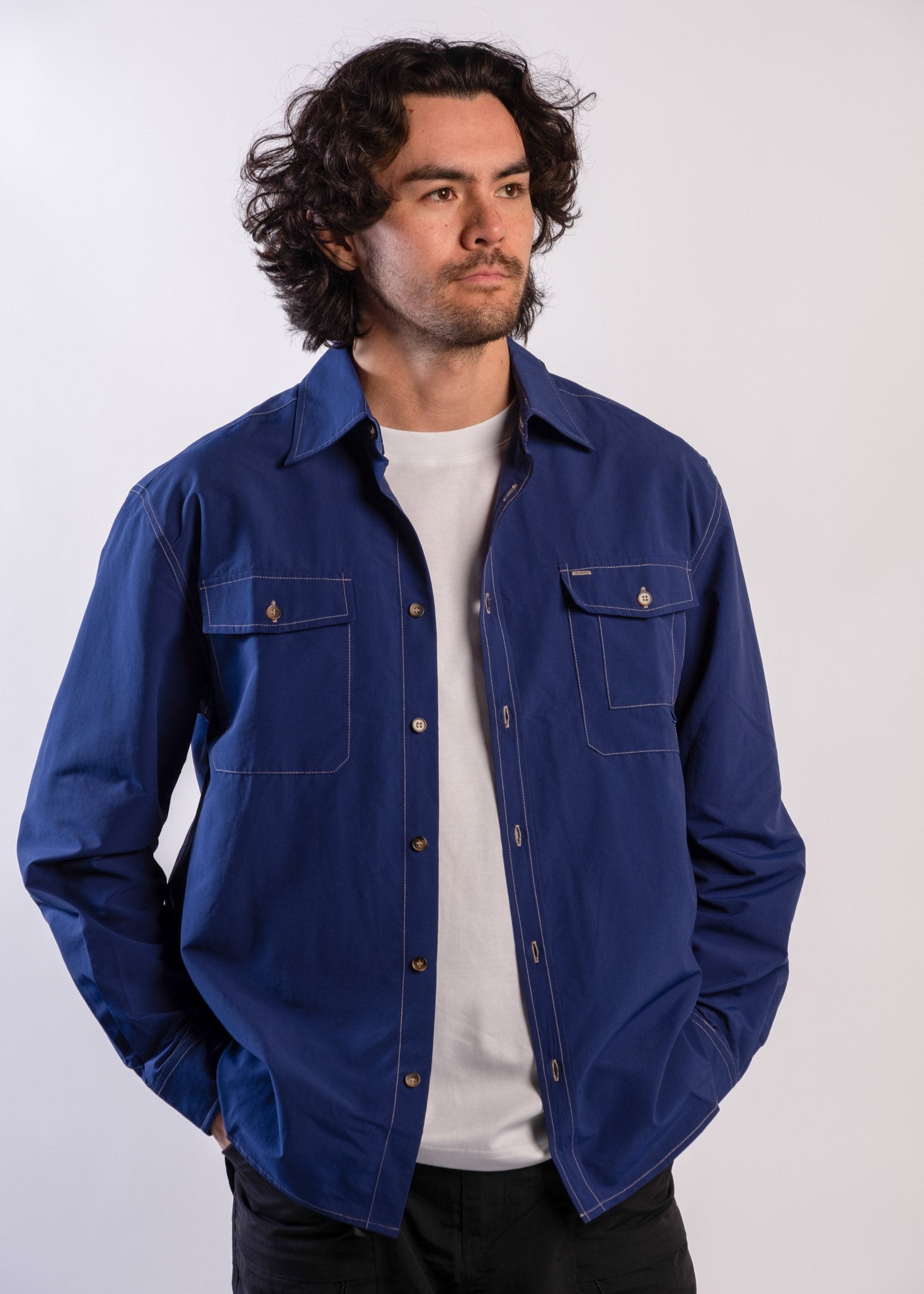 Person wearing a blue Sun Ray UPF50+ sun protection overshirt