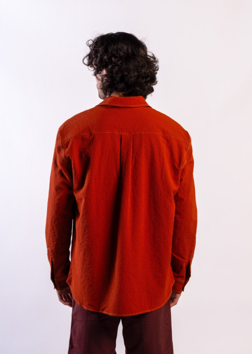 Person wearing Sun Ray UPF50+ sun protection seersucker overshirt