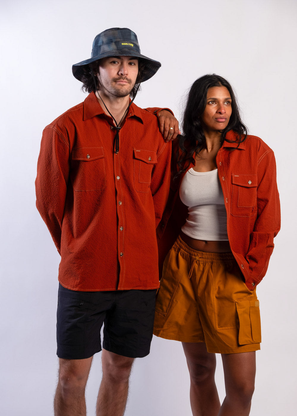 Couple wearing Sun Ray UPF50+ sun protection seersucker overshirt
