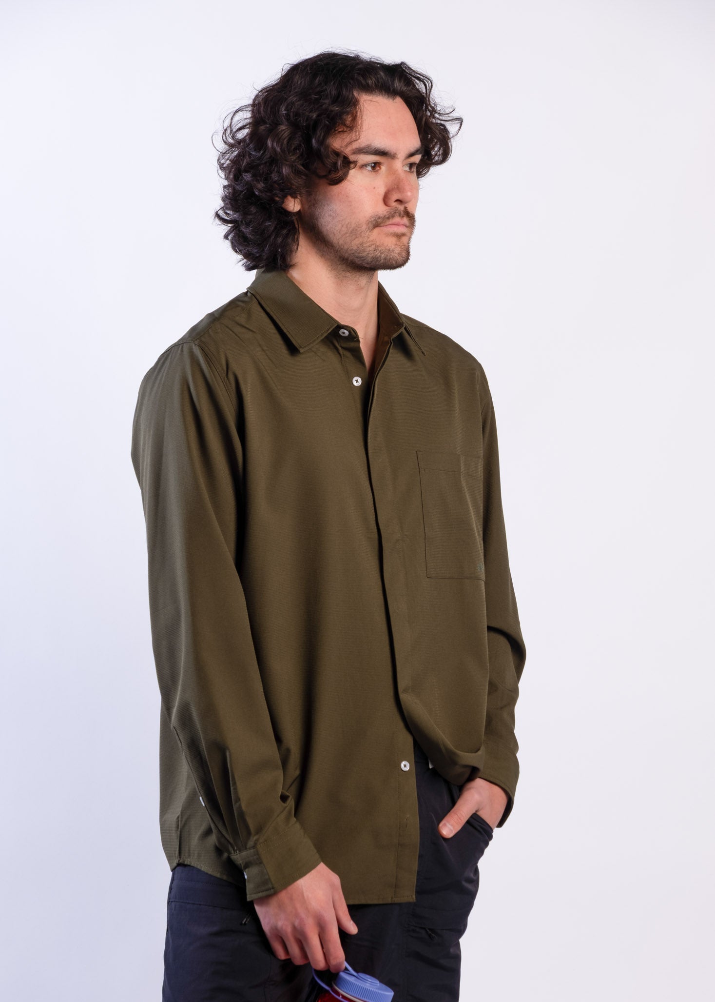 Person wearing olive green Sun Ray UPF50+ sun protection sun shirt