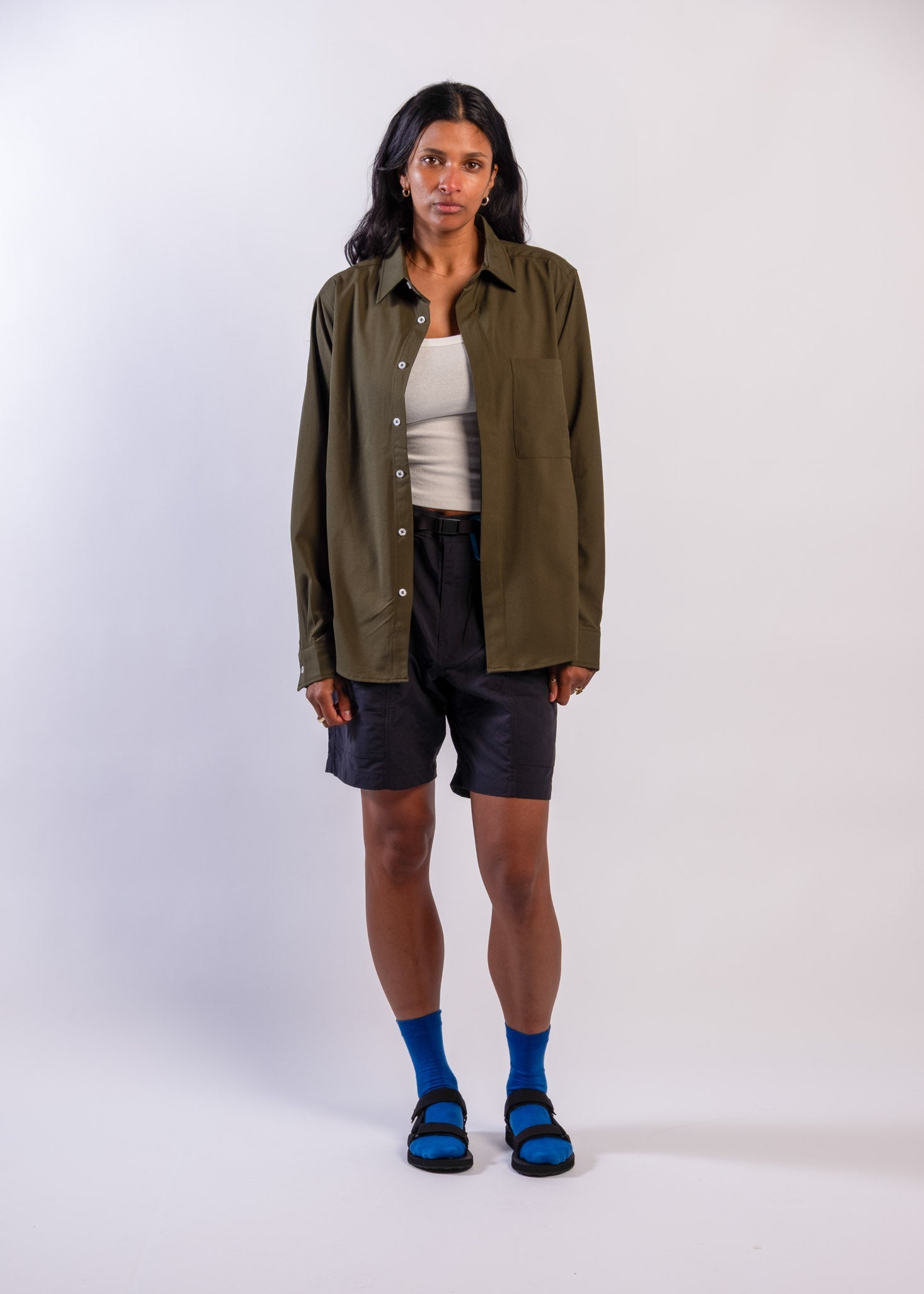 Person wearing olive green Sun Ray UPF50+ sun protection sun shirt