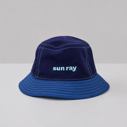 A navy blue kids bucket hat with detachable neck flap made from UPF50+ fabric.