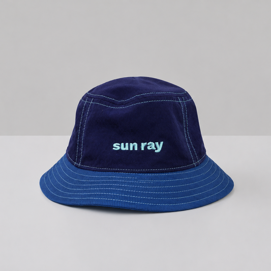 A navy blue kids bucket hat with detachable neck flap made from UPF50+ fabric.