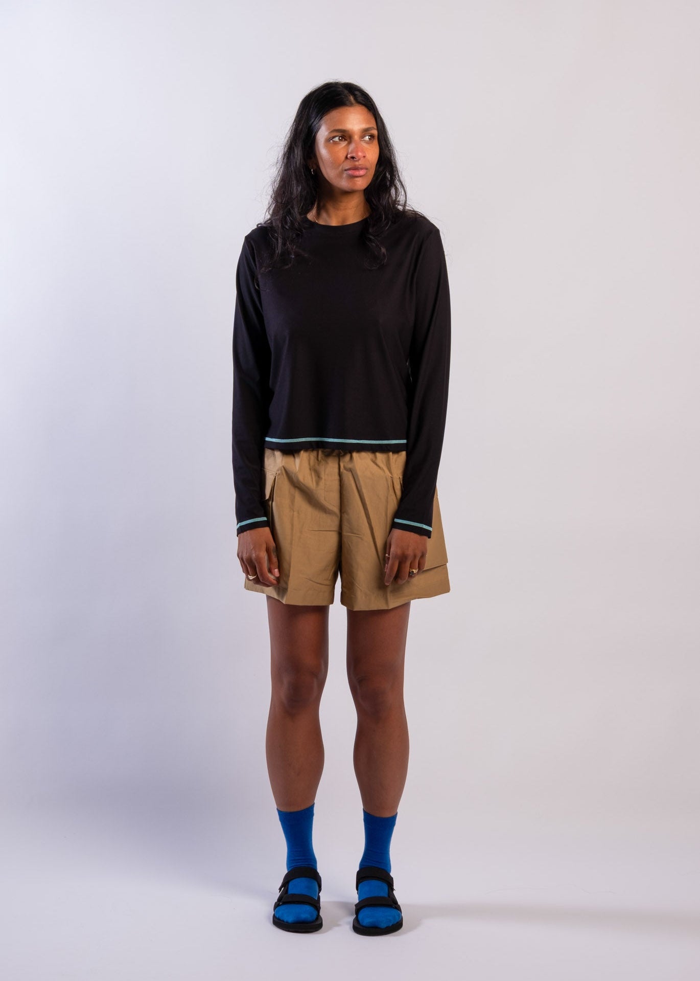 Woman wearing Sun Ray UPF50+ sun protection black long-sleeve top
