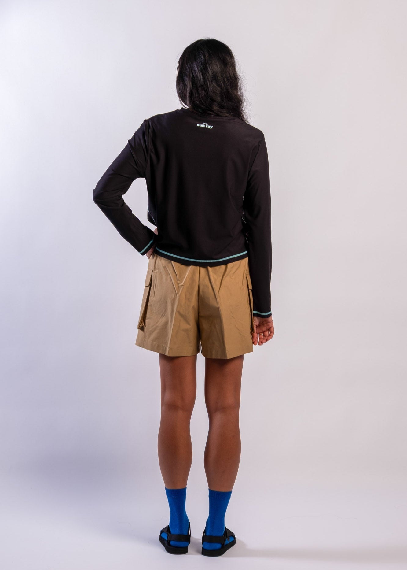 Woman wearing Sun Ray UPF50+ sun protection black long-sleeve top