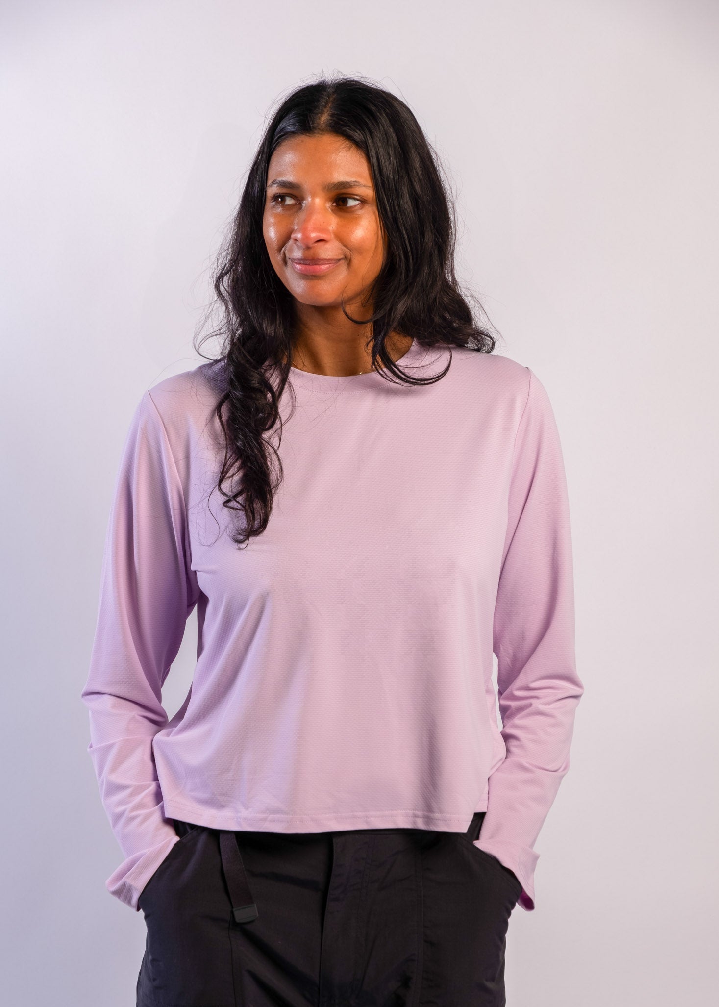 A sun smart woman wears the Sun Ray UPF50+ Sun Protection Clothing All G Long Sleeve Tee lilac boxy fit