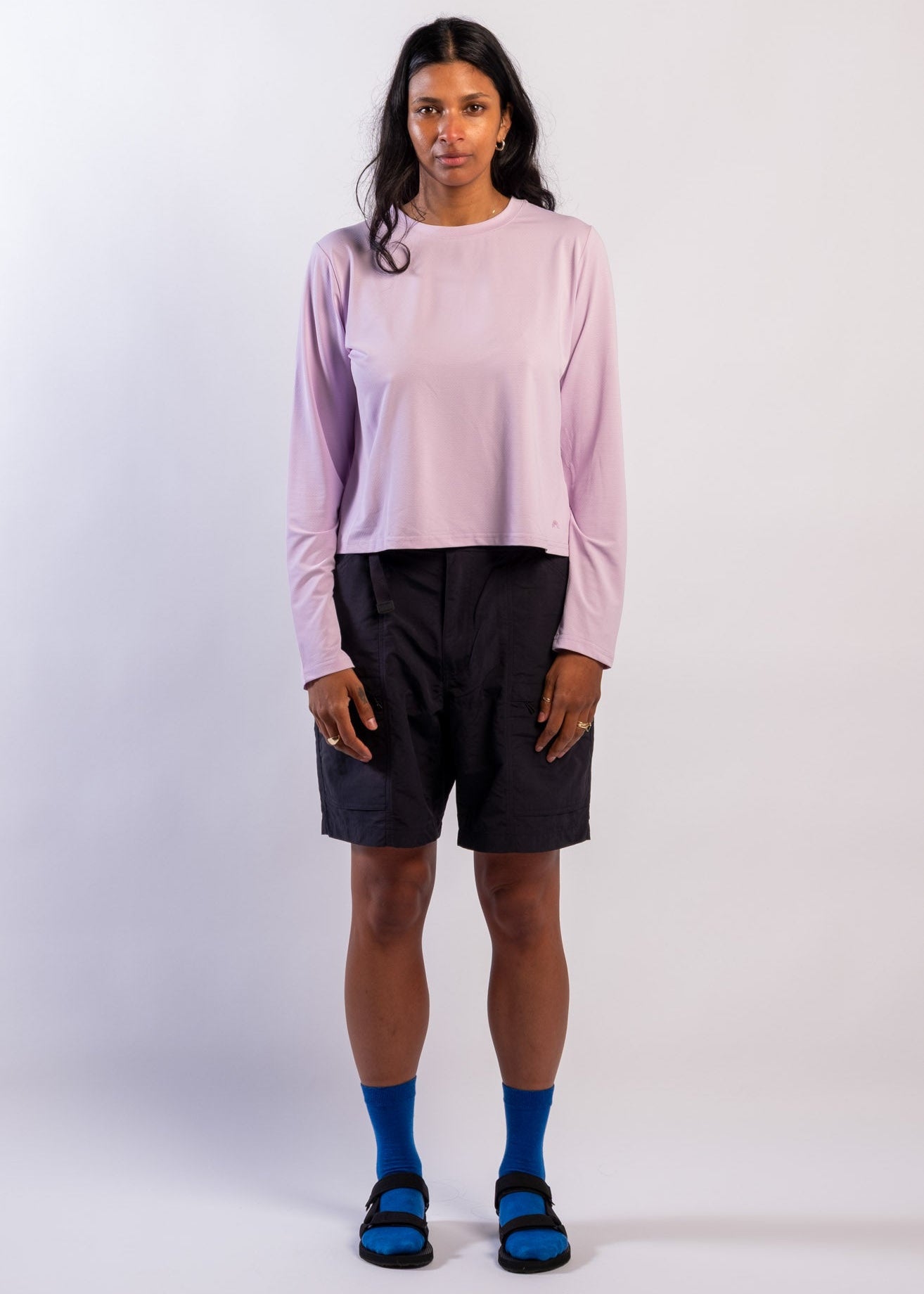 A sun smart woman wears the Sun Ray UPF50+ Sun Protection Clothing All G Long Sleeve Tee lilac boxy fit